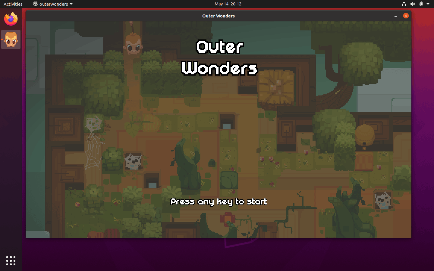 Screenshot of the Ubuntu desktop where a window showing the title screen of Outer Wonders is displayed.